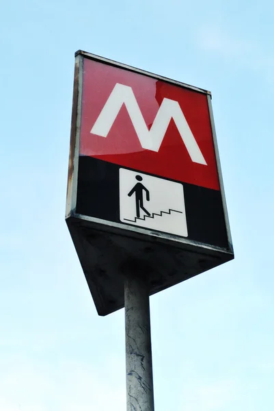 Subway sign against sky in Rome Italy