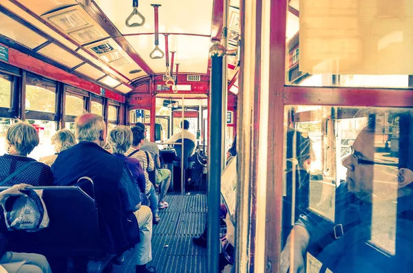 People at Typical Tramway in Lisbon