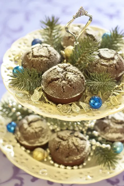 Christmas chocolate cakes with powdered sugar