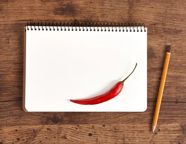 Blank notepad for recipes with pepper for your shopping list