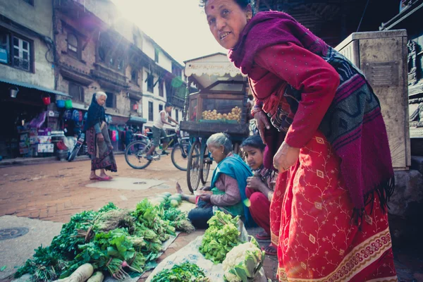 Nepalese women working on a fruits and vegetables market in nepa