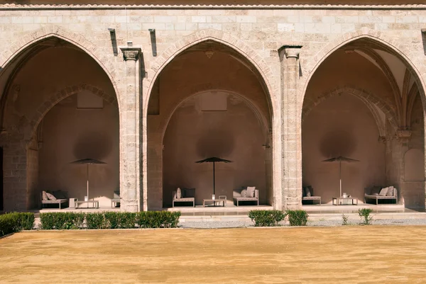 Summer courtyard with Seating inside arches