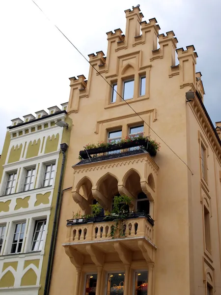 Decorative balconies on the facades of old buildings