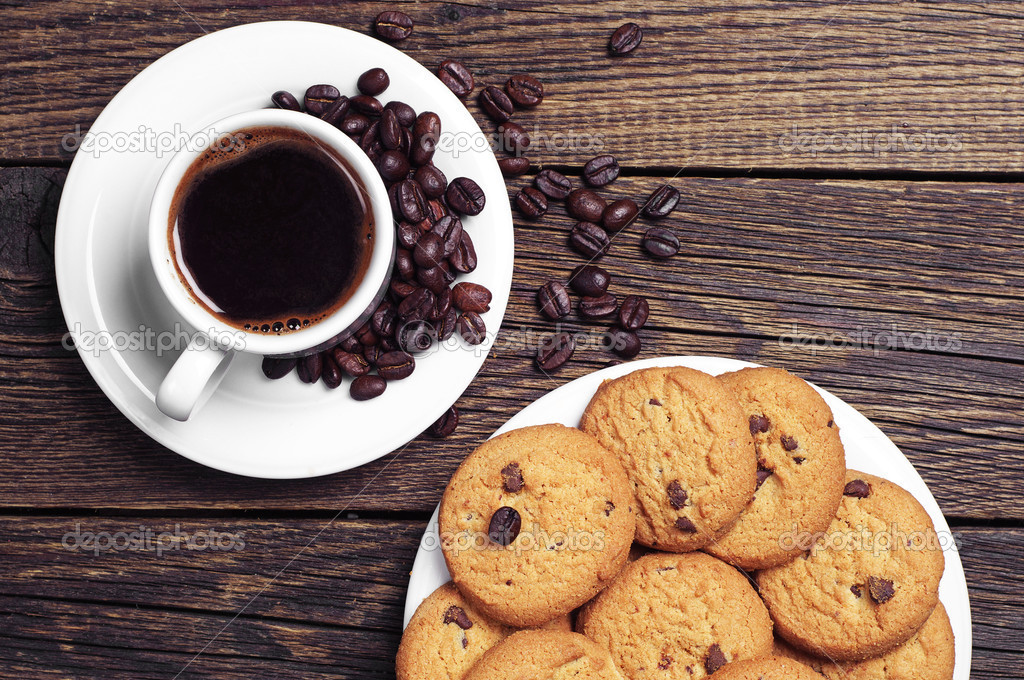Cup of coffee and cookies — Stock Photo © Sasajo 41180955