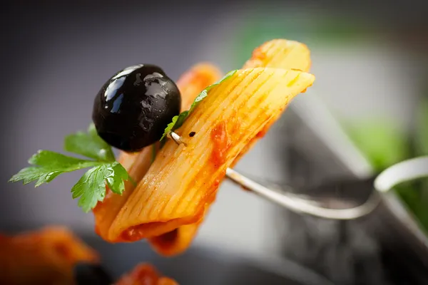 Pasta with tomato and olives