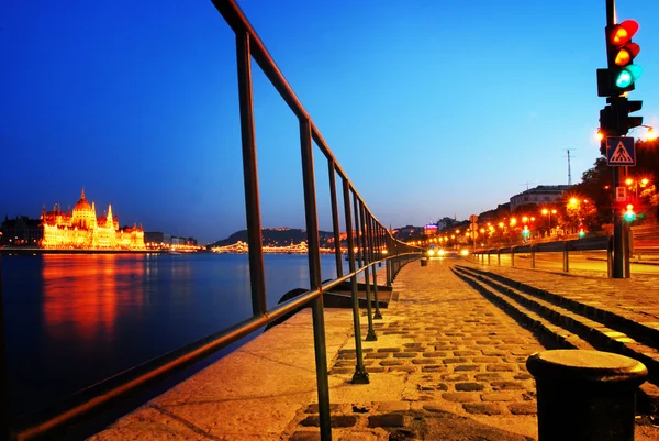 Night street of a street in Budapest with Parliament building