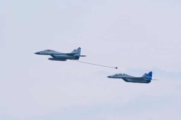 MiG jet fighters demonstrate mid-air refueling