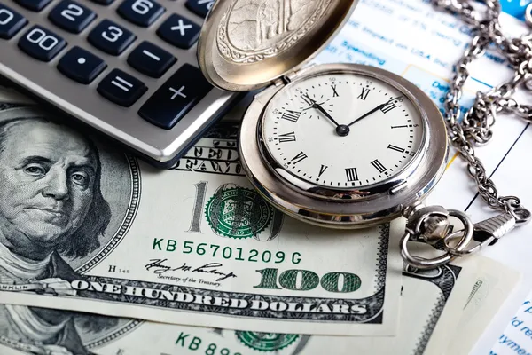 Money, clock and calculator — Stock Photo #14522671