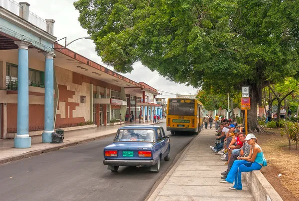 Locals waiting for a bus