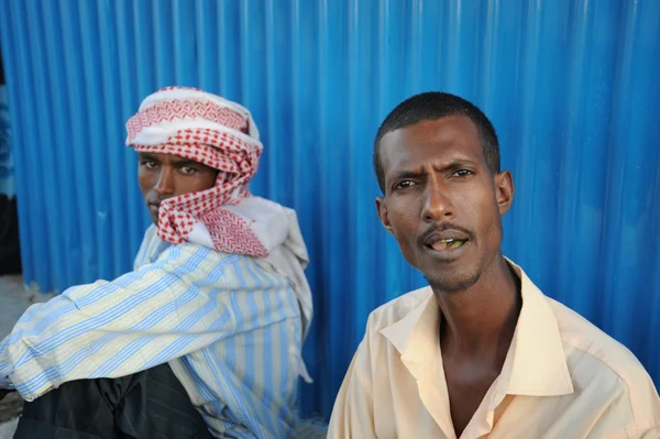 Men use Khat during a meeting in a cafe.