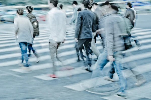 Crowd on zebra crossing street