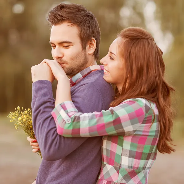 Guy kisses the girl's hand