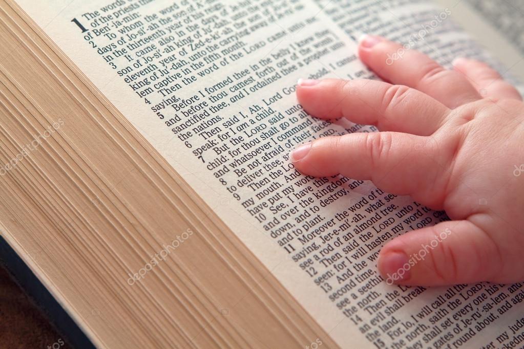 the babys the bible and on baby on open bible stock photo 169 balazs 22154441 the babys the bible and on baby on open bible stock photo 169 balazs 22154441