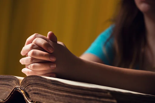 Woman Praying With Bible