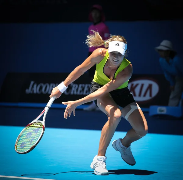 MELBOURNE, AUSTRALIA - JANUARY 26: Maria Kirilenko in action at her quarter final loss to Jie Zheng during the 2010 Australian Open