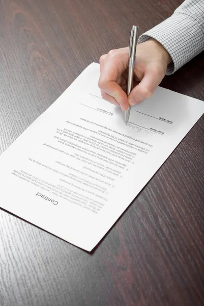 Businessman  signing papers