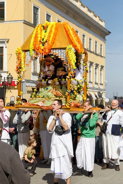 ODESSA, UKRAINE - APRIL 1: Devotees from Hare Krishna dancing wi