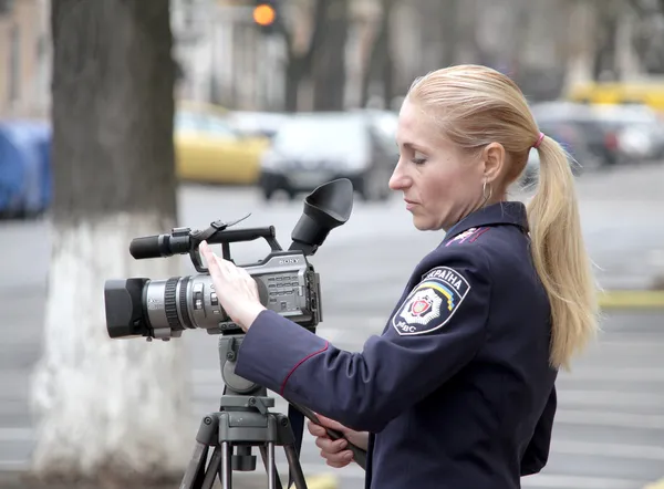 Odessa, Ukraine - December 30, 2011 : Beautiful girl cop shoots