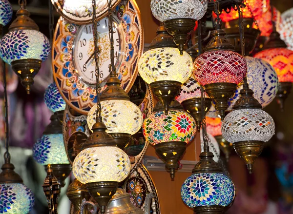 Ornate glass lights at market stall