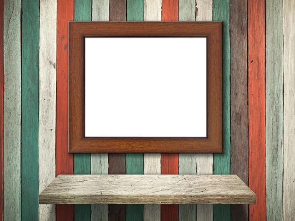 Picture frame on Old wood wall and shelf