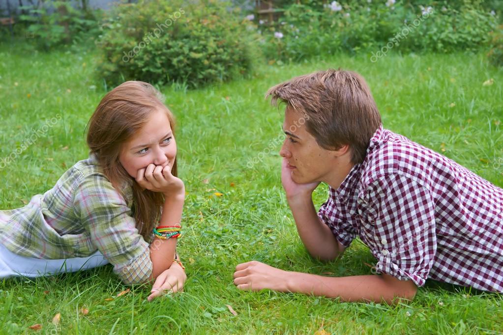 http://st.depositphotos.com/1017039/4272/i/950/depositphotos_42721607-Boy-and-girl-teens-lying-on-the-grass.jpg