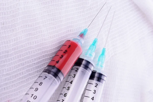 Medical syringes on a white background