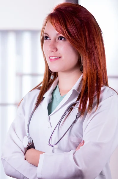 Attractive young woman doctor in the lab