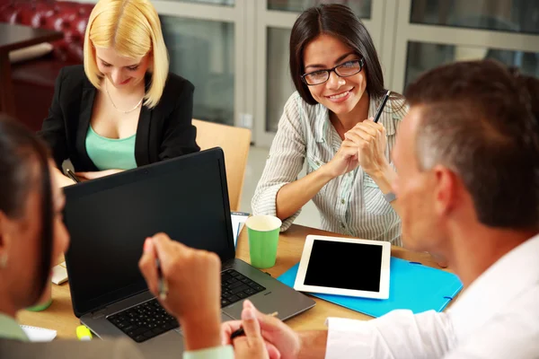 Handsome group of business people in office