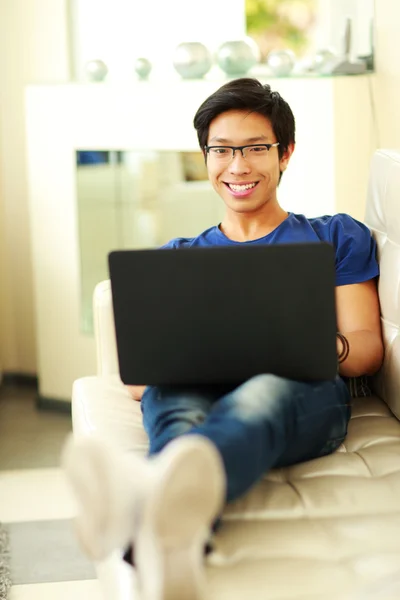 Handsome asian man at home