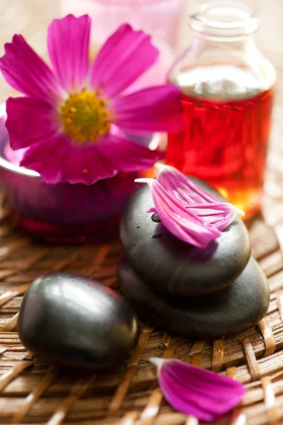 Spa concept: essential oil for aromatherapy and Zen Stones