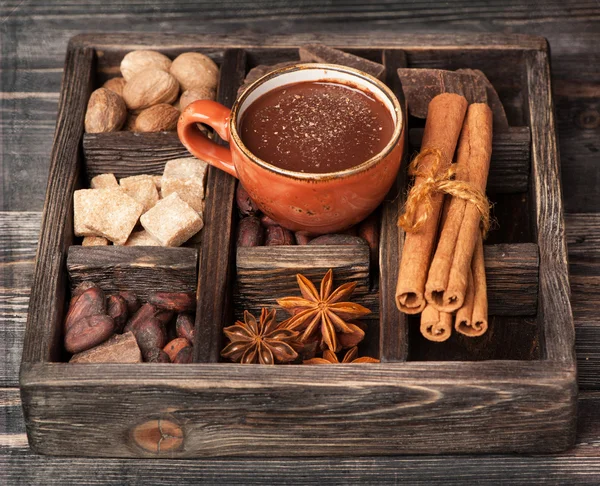 Chocolate and vintage wooden box with spices