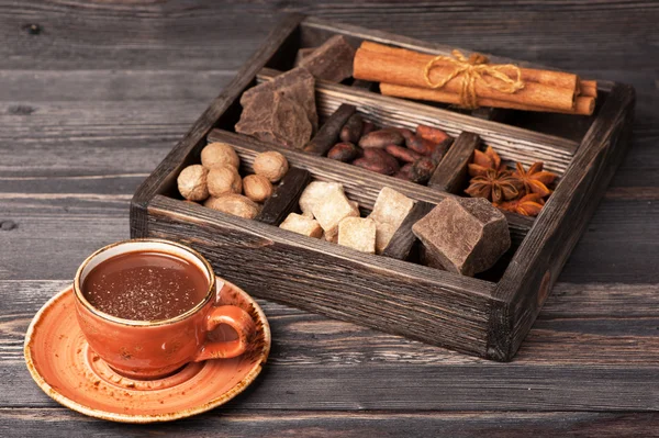 Chocolate and vintage wooden box with spices