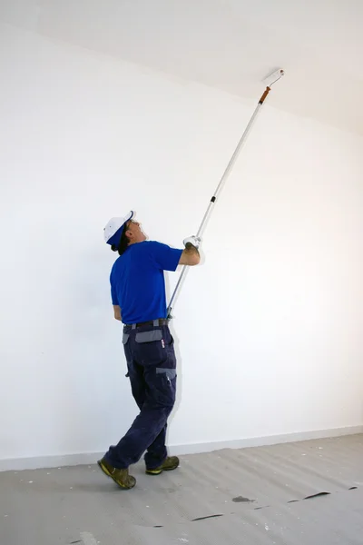 House painter painting ceiling