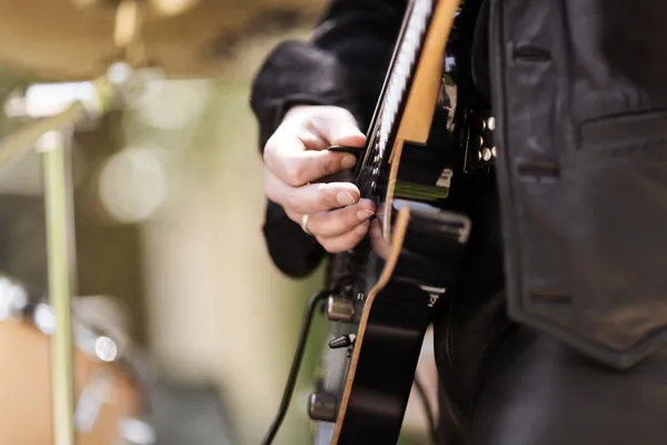 Play on guitar, selective focus