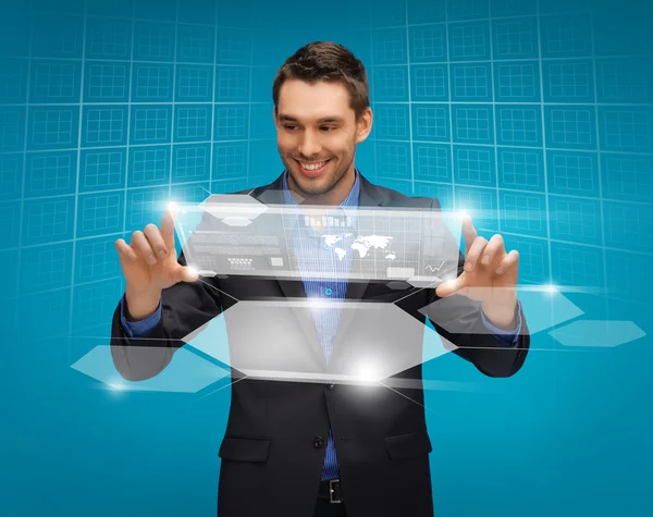 Man in suit working with virtual screens