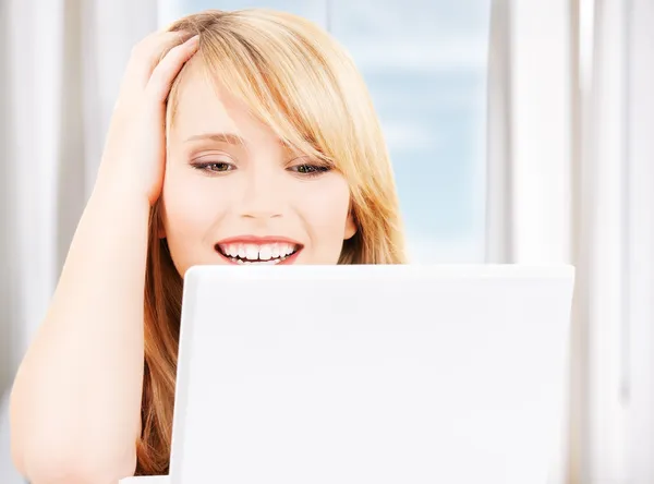 Teenage girl with laptop computer — Stock Photo #21835631