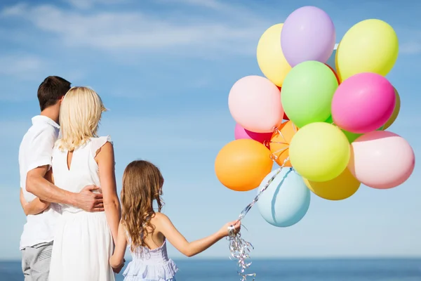 Family with colorful balloons