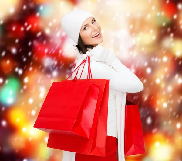 Picture of happy woman with shopping bags
