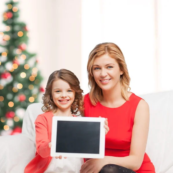 Mother and daughter with tablet pc