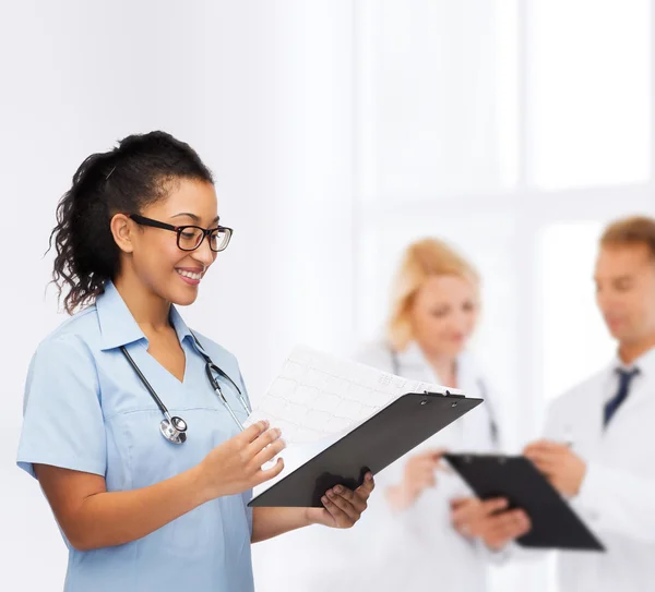 Smiling female african american doctor or nurse