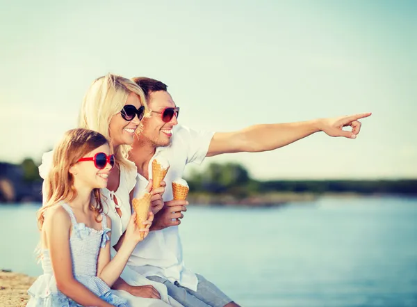 Happy family eating ice cream