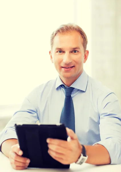 Businessman with tablet pc in office