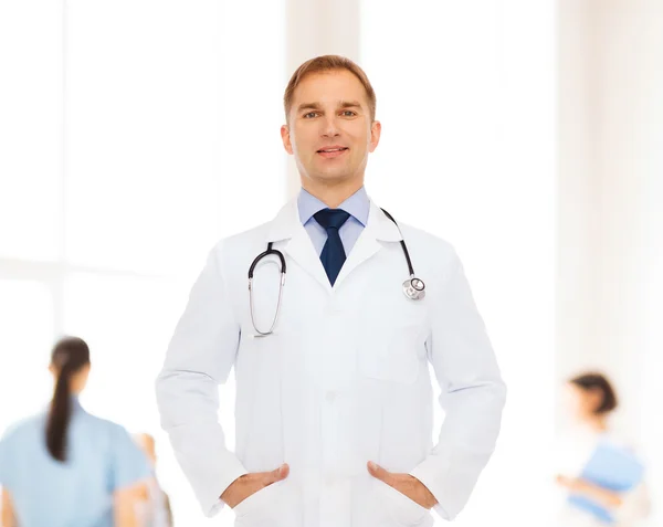 Smiling male doctor with stethoscope