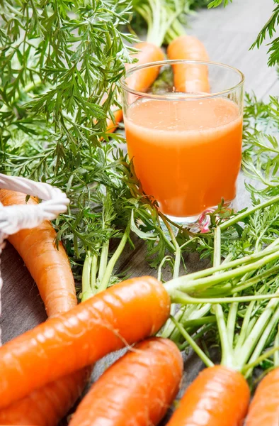 Fresh carrots and healthy juice