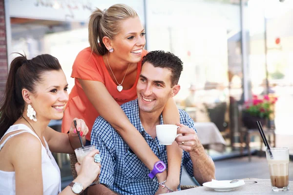 Couple with a friend during lunch