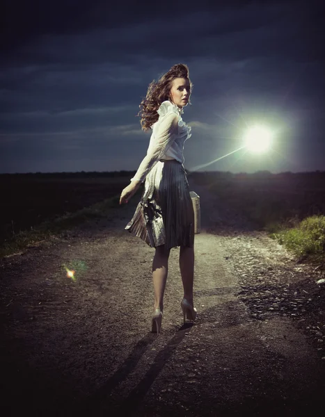 http://st.depositphotos.com/1018174/1432/i/450/depositphotos_14328985-stock-photo-beautiful-woman-walking-away.jpg