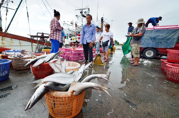 CHONBURI, THAILAND - AUGUST 17 : Unidentified people trading fish on August 17, 2013 in Sriracha, Chonburi, Thailand