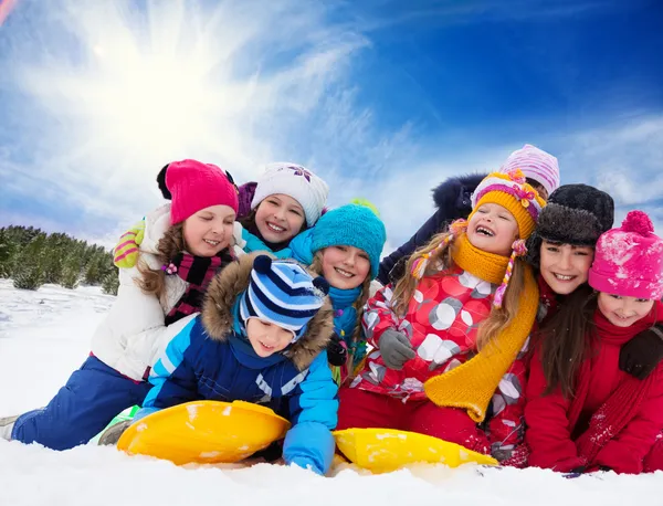 Group of happy kids outside at winter