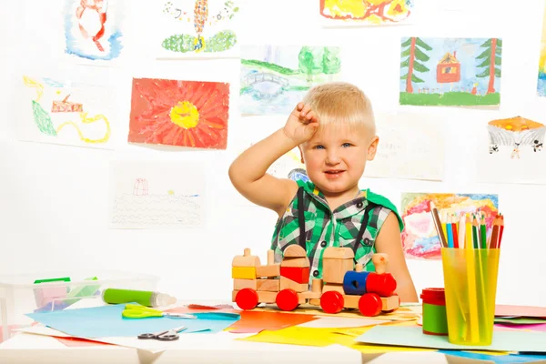 Boy in the preschool art class