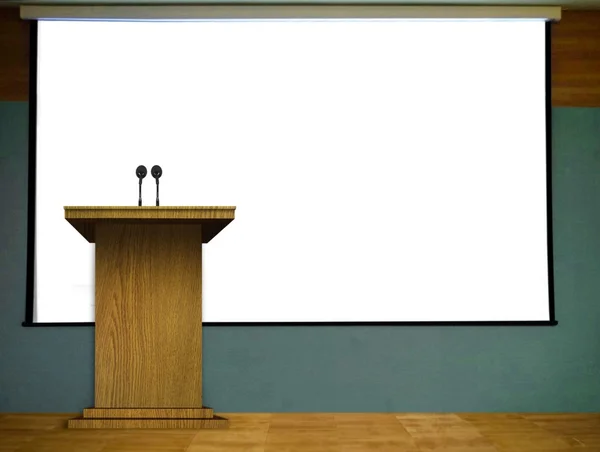 Podium on Stage with Blank Projector Screen